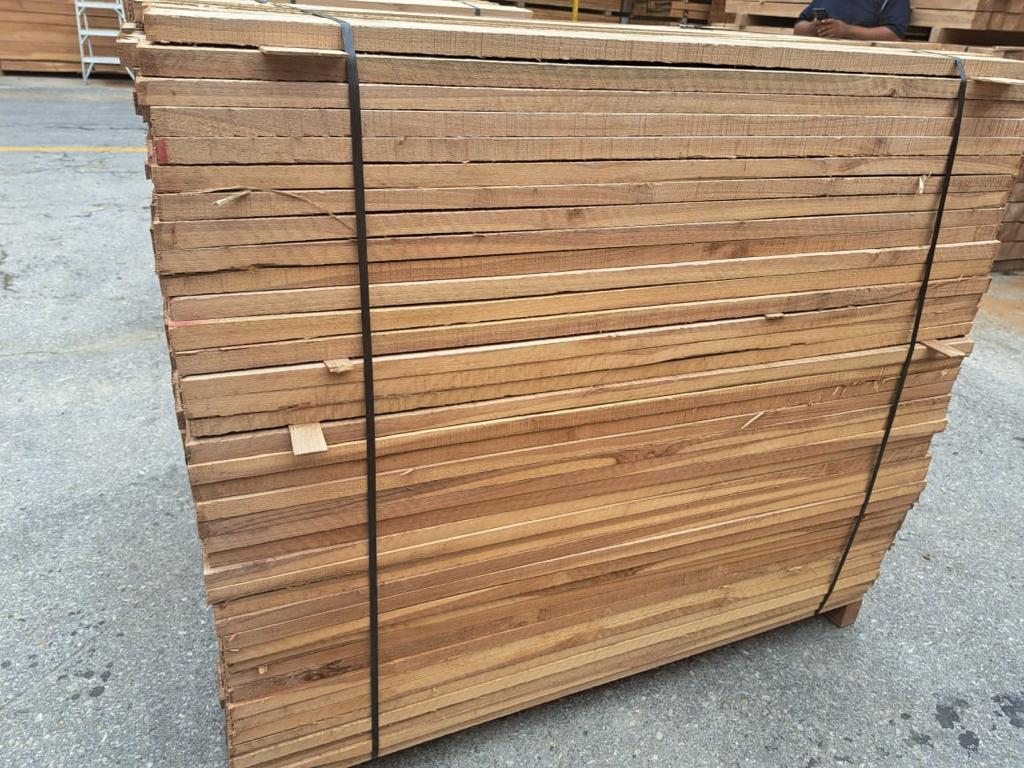 Bundled sawn teak boards prepared for trade